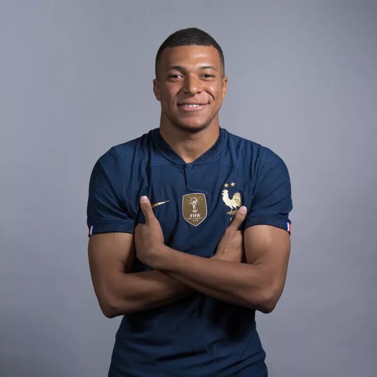Kylian Mbappe posing for a photo