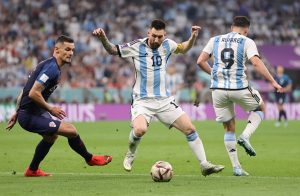 Lionel Messi, part of the Argentina predicted lineup, dribbling