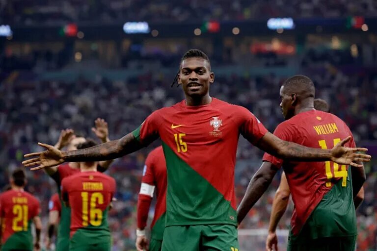 Rafael Leao celebrating on the pitch