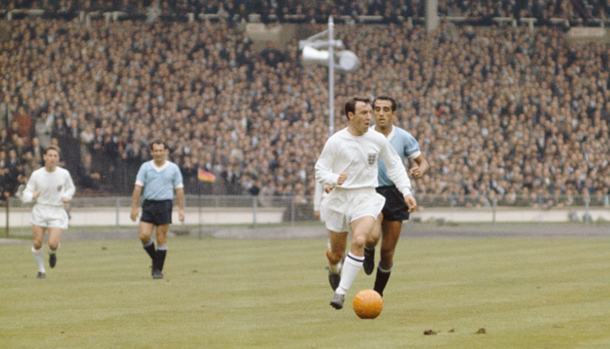 England Striker Jimmy Greaves Outpaces a Uruguay Defender at Wembley Stadium