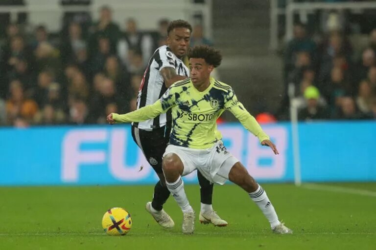 Tyler Adams, expected to play in Leeds United vs West Ham United, finishing a tackle