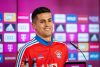 Joao Cancelo at a press conference announcing his signing with Bayern Munich