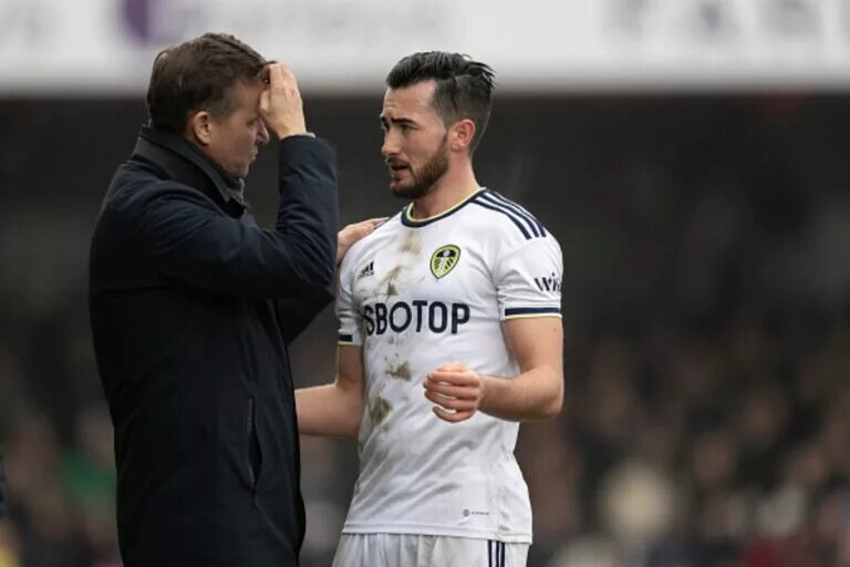 Leeds United team news features Jack Harrison, pictured talking to Jesse Marsch