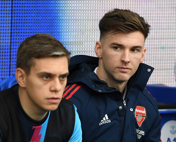 Kieran Tierney sits on Arsenal bench