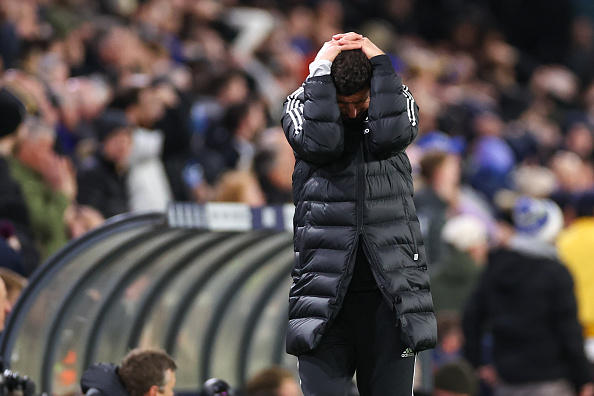 Javi gracia, on the verge of sacking as Leeds manager, with head in hands