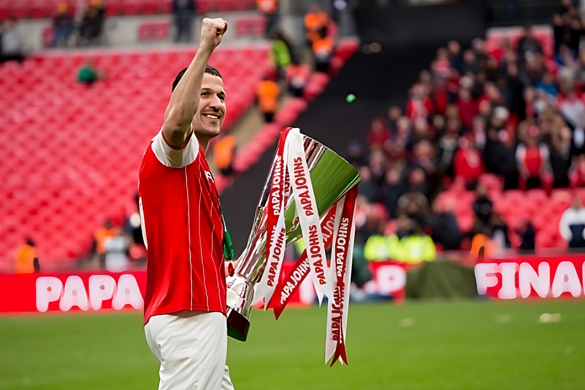 Doncaster Rovers sign Richard Wood, pictured celebrating EFL Trophy success with Rotherham United