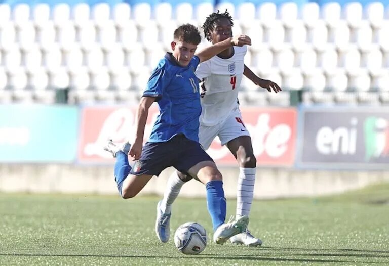 Callum Olusesi, pictured playing for England U16s, is signing a contract extension at Tottenham despite interest from Manchester United