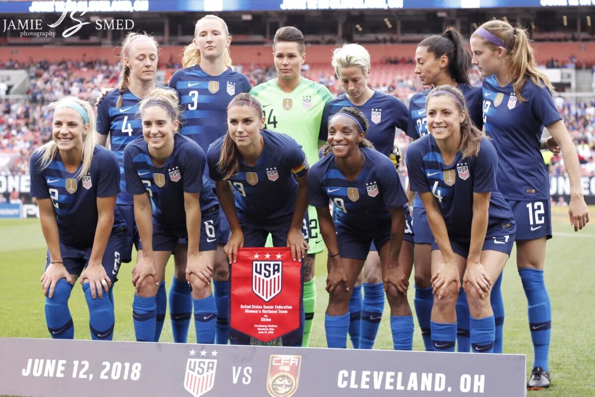 Will the USWNT win big again? Jamie Smed, taken 12 June, 2018. https://commons.wikimedia.org/wiki/File:USWNT_group_photo_%2842878126761%29.jpg