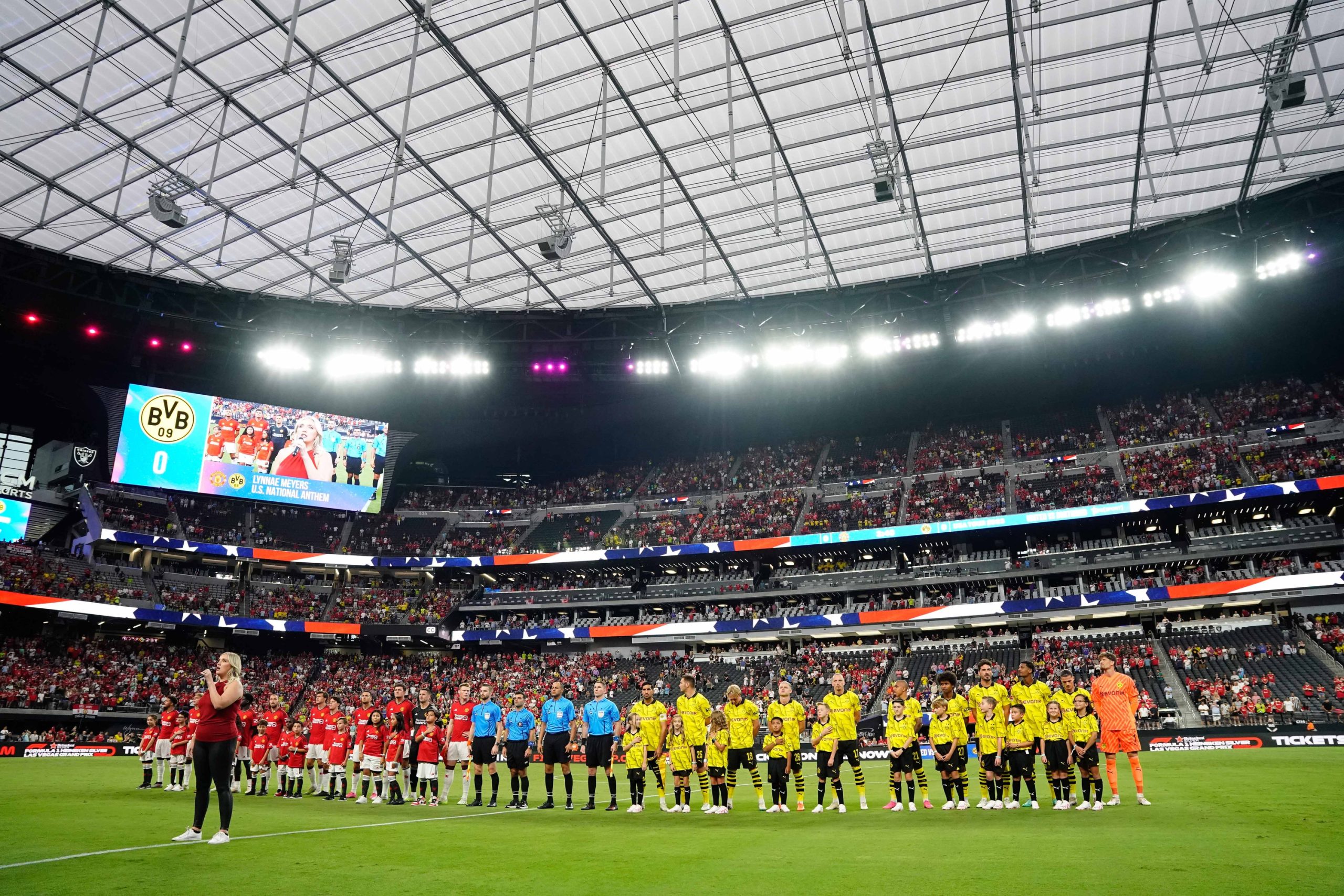 Jul 30, 2023; Las Vegas, Nevada, USA; Manchester United and Borussia Dortmund the playing of the national anthem at Allegiant Stadium. Mandatory Credit: Lucas Peltier-USA TODAY Sports