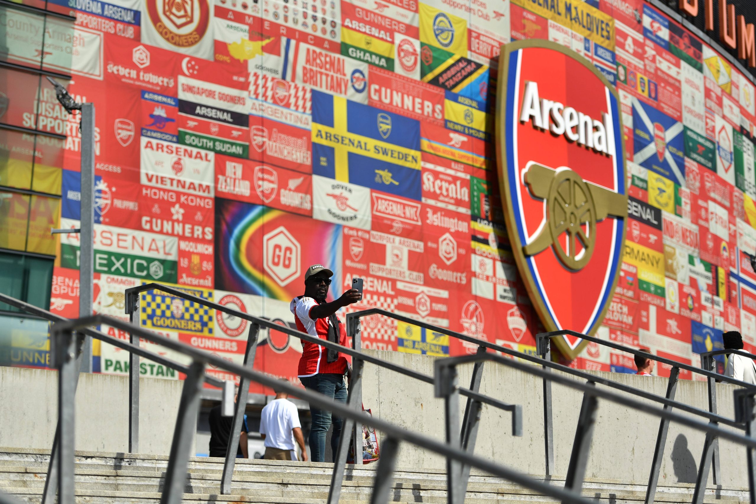 Fan taking photo outside of the Emirates stadium - Arsenal Predicted Lineup