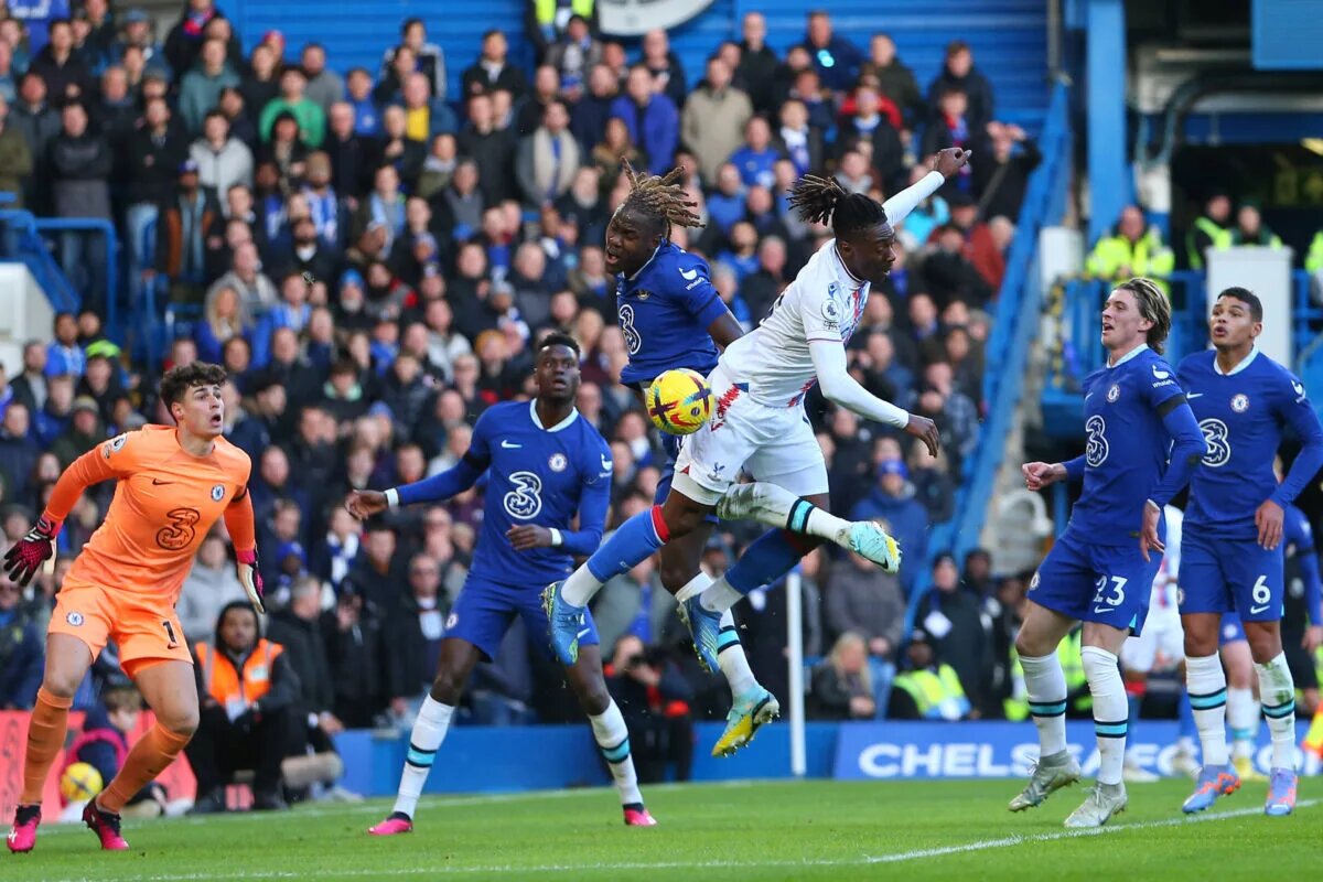 Trevoh Chalobah and Eberechi Eze battle for the ball in the air