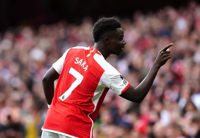 Arsenal, Bukayo Saka celebrating
