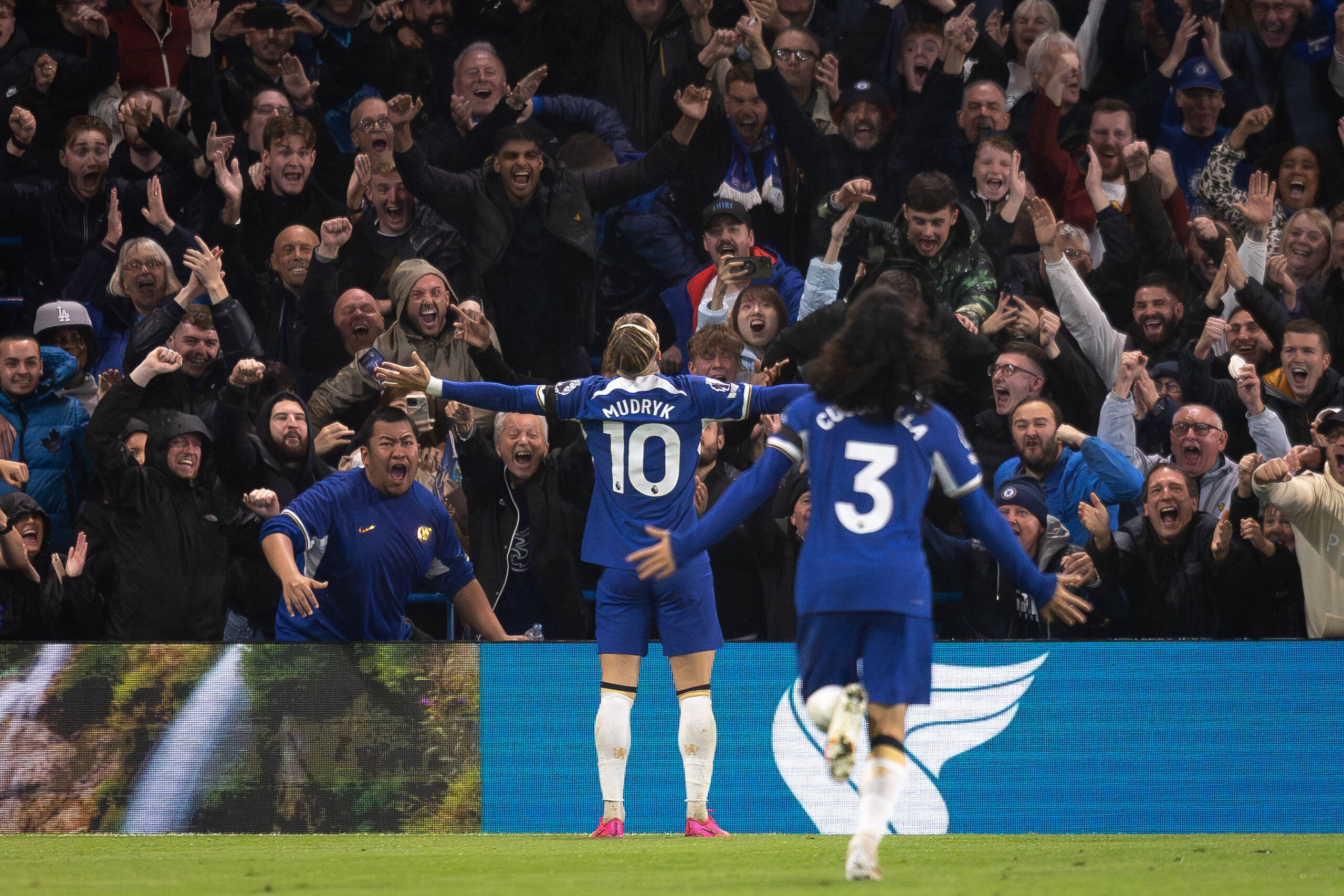 Mykhailo Mudryk celebrates goal in front of Chelsea fans