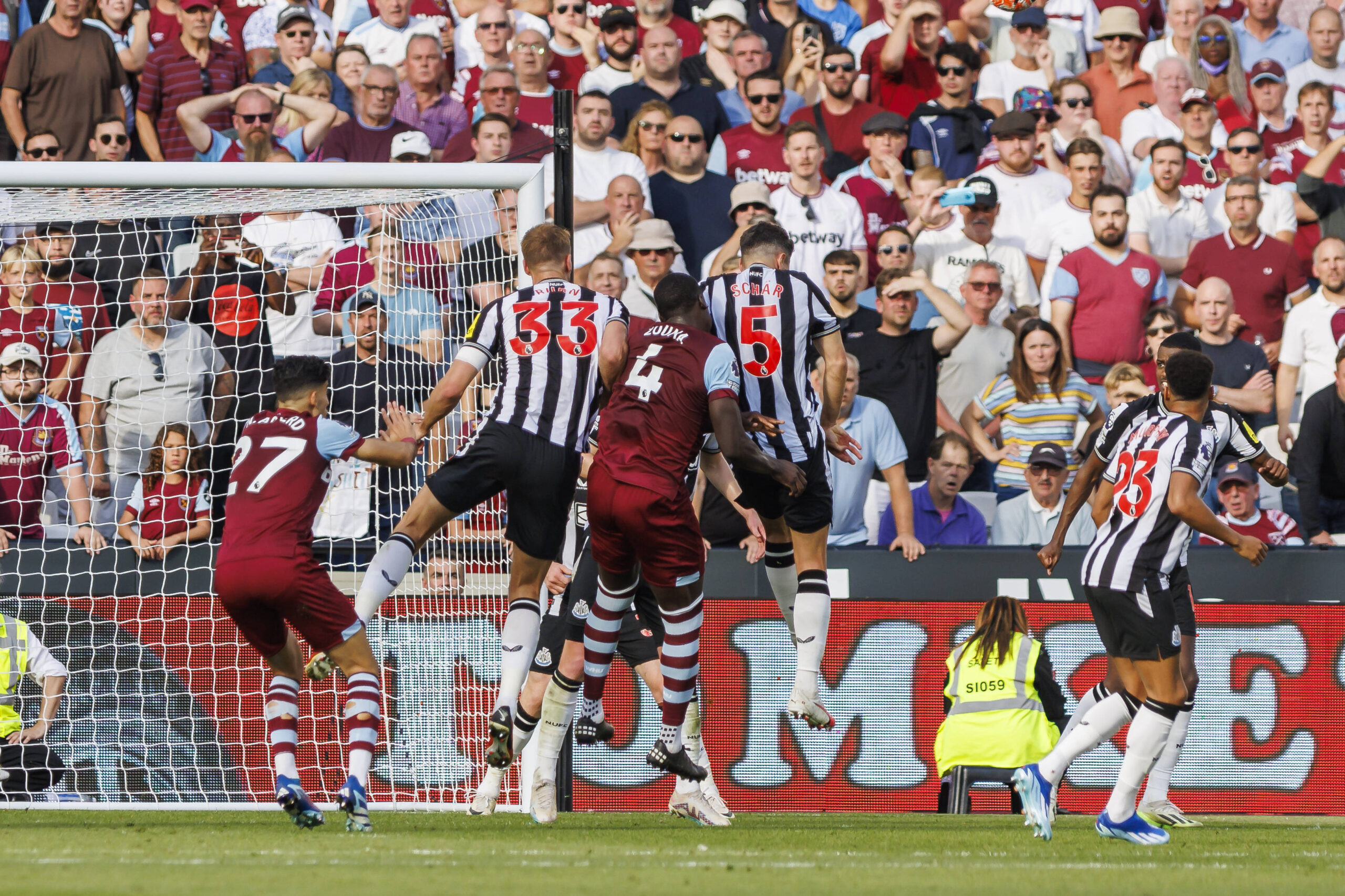 Newcastle and Aston Villa fight for a corner