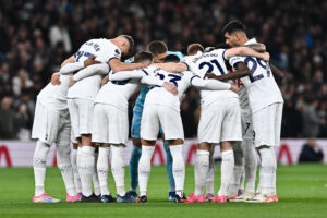 Tottenham Hotspur players circle before a match for a team talk