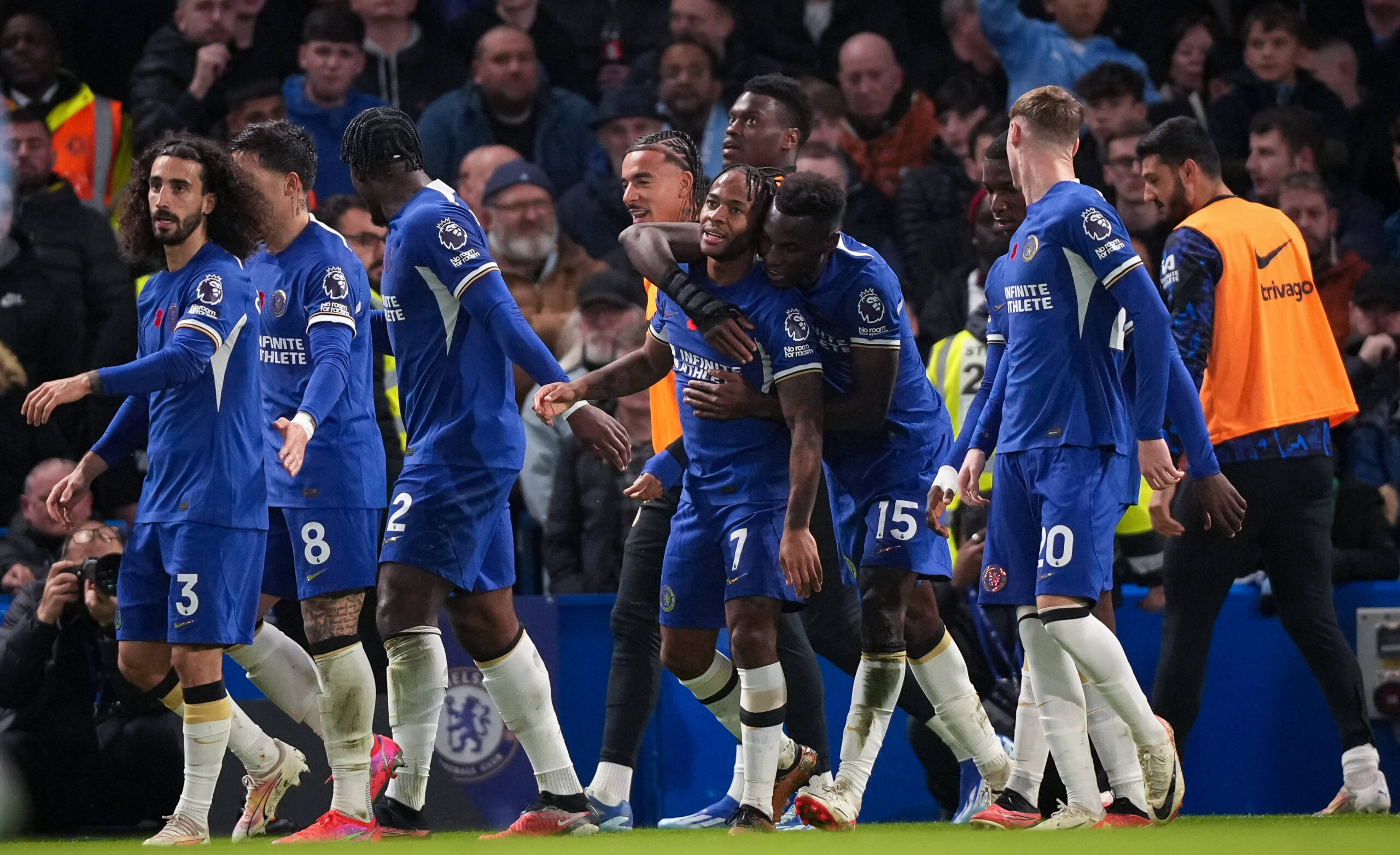 Chelsea players celebrate together following goal