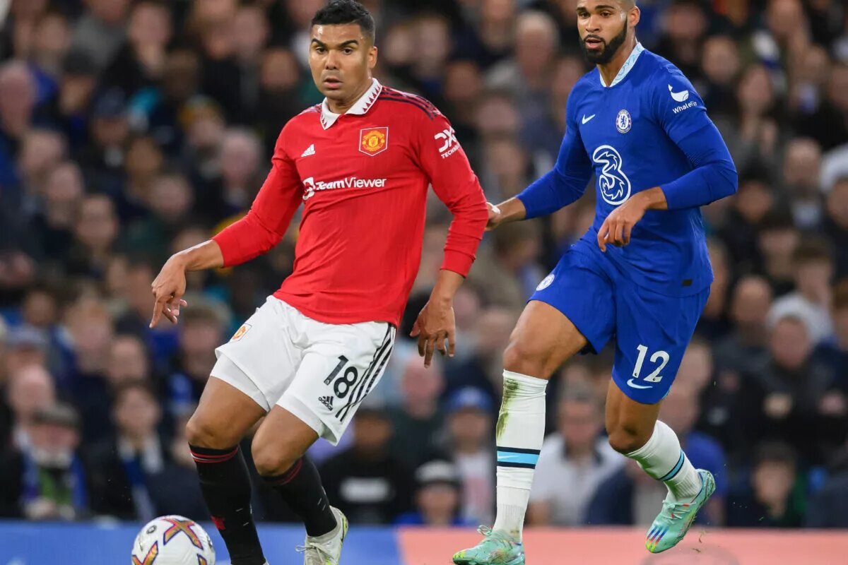 Casemiro attempts to keep the ball amid pressure from Ruben Loftus-Cheek