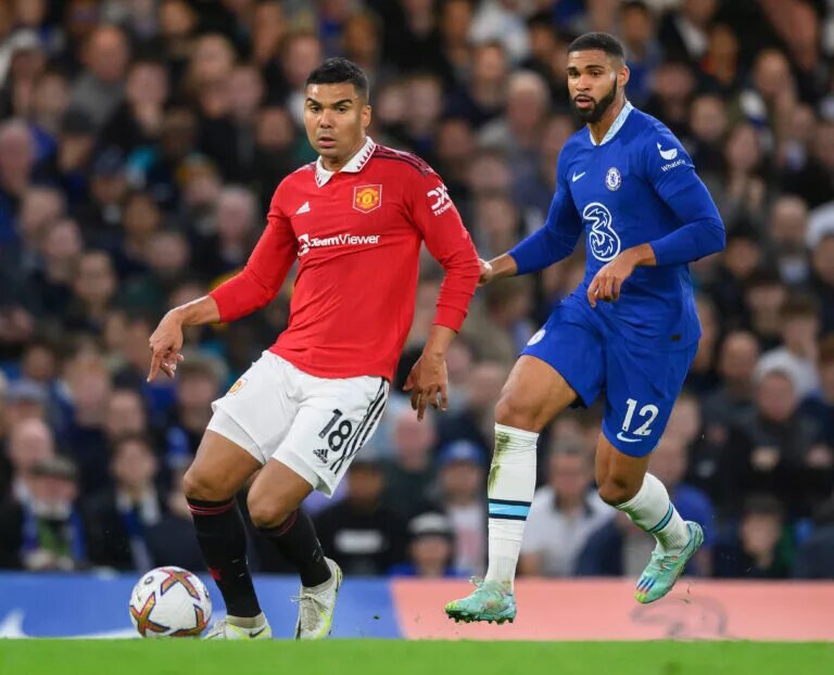 Casemiro attempts to keep the ball amid pressure from Ruben Loftus-Cheek