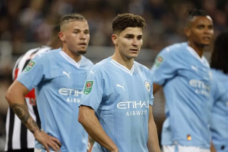 Manchester City players on the pitch during a Carabao Cup tie