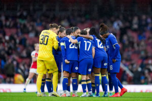 Chelsea Women huddle together before the match
