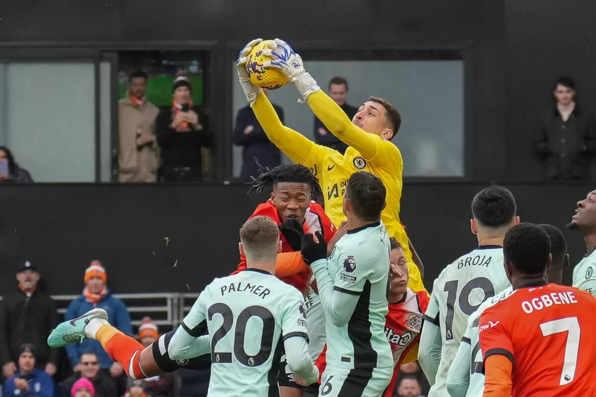 Djordje Petrovic claims a cross against Luton