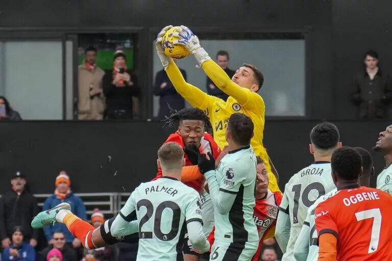 Djordje Petrovic claims a cross against Luton