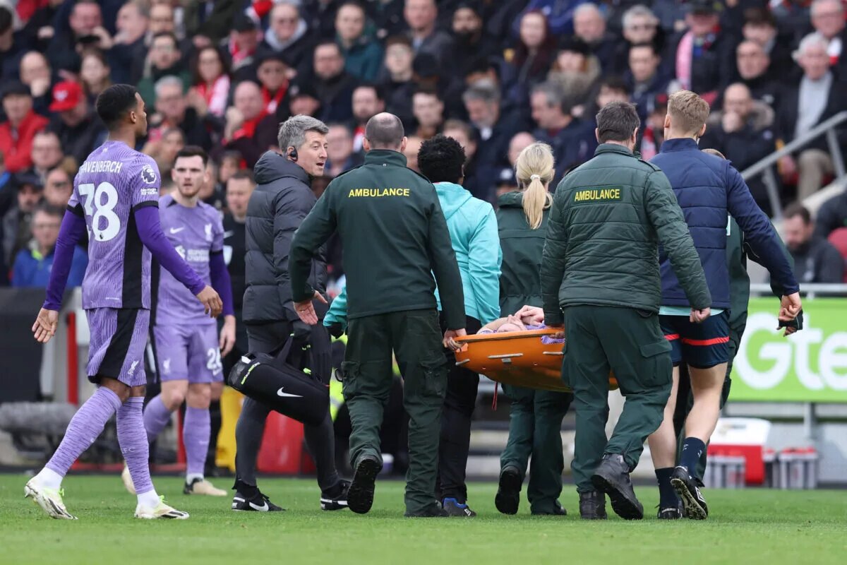 Liverpool's Diogo Jota is stretchered off.