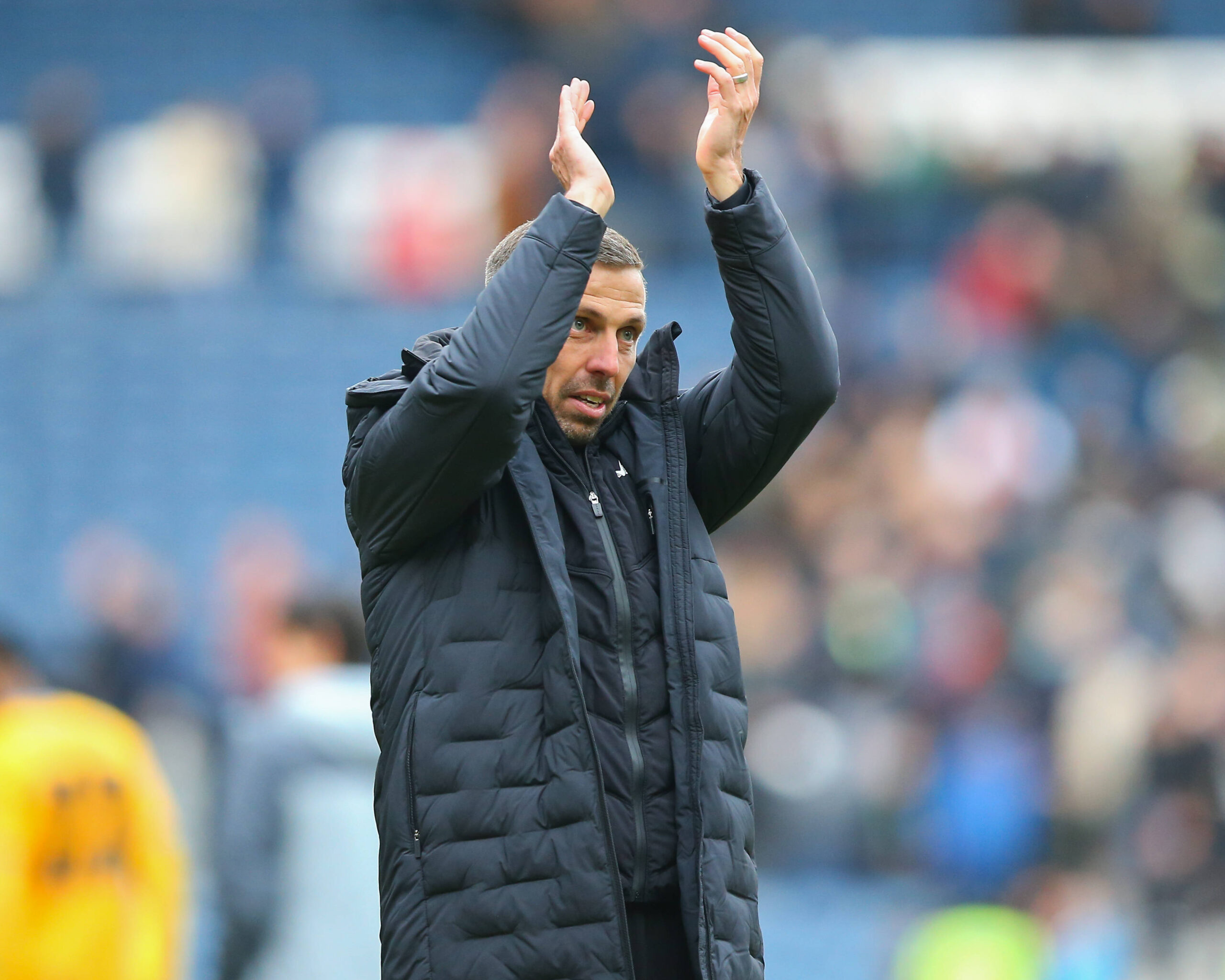 Wolves manager Gary O'Neil applauds fans after match