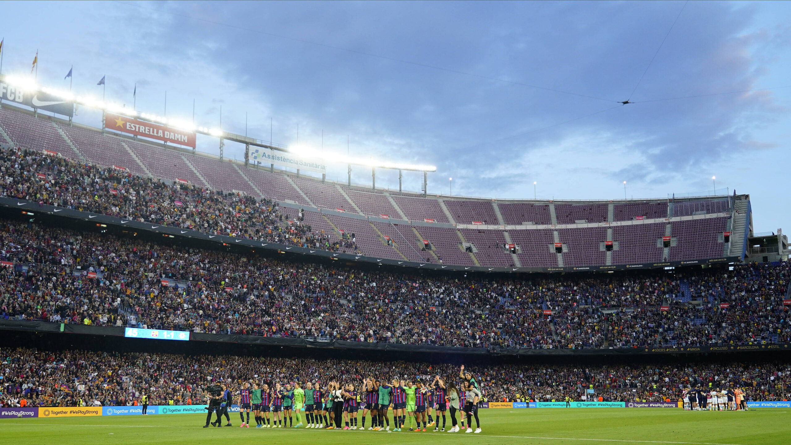 Barcelona Femeni squad line up at Camp Nou after their win over Chelsea Women