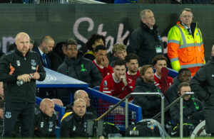 Liverpool bench watches on as their team trails 2-0