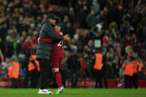 Jurgen Klopp hugs Liverpool Andy Robertson