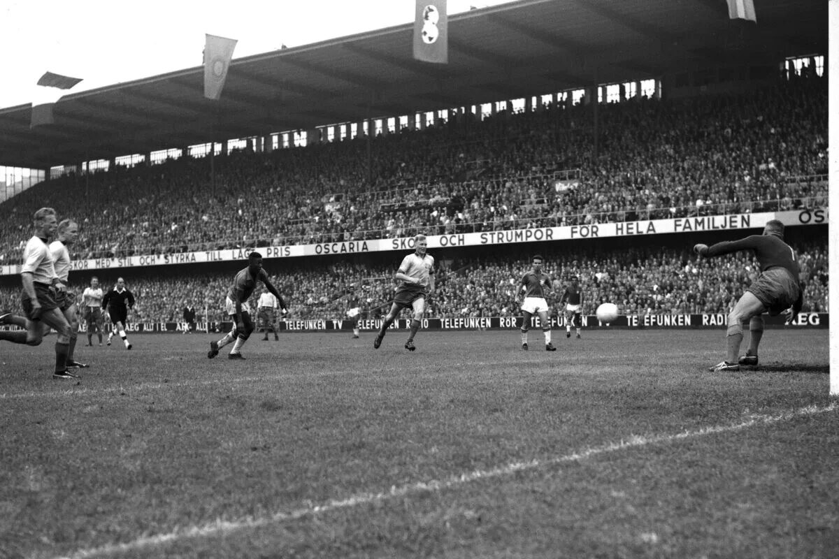 Image of Pele breakign free in the box to score during the World Cup final