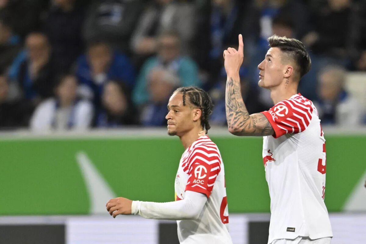 Benjamin Sesko and Xavi Simons celebrate a goal against Hoffenheim in the Bundesliga