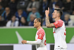 Benjamin Sesko and Xavi Simons celebrate a goal against Hoffenheim in the Bundesliga