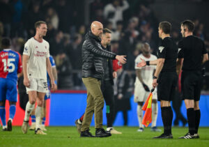 Erik ten Hag shakes hands with officials following defeat to Crystal Palace