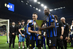 Inter players celebrate with the Serie A trophy