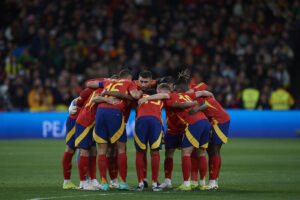 Spain squad huddles before a match