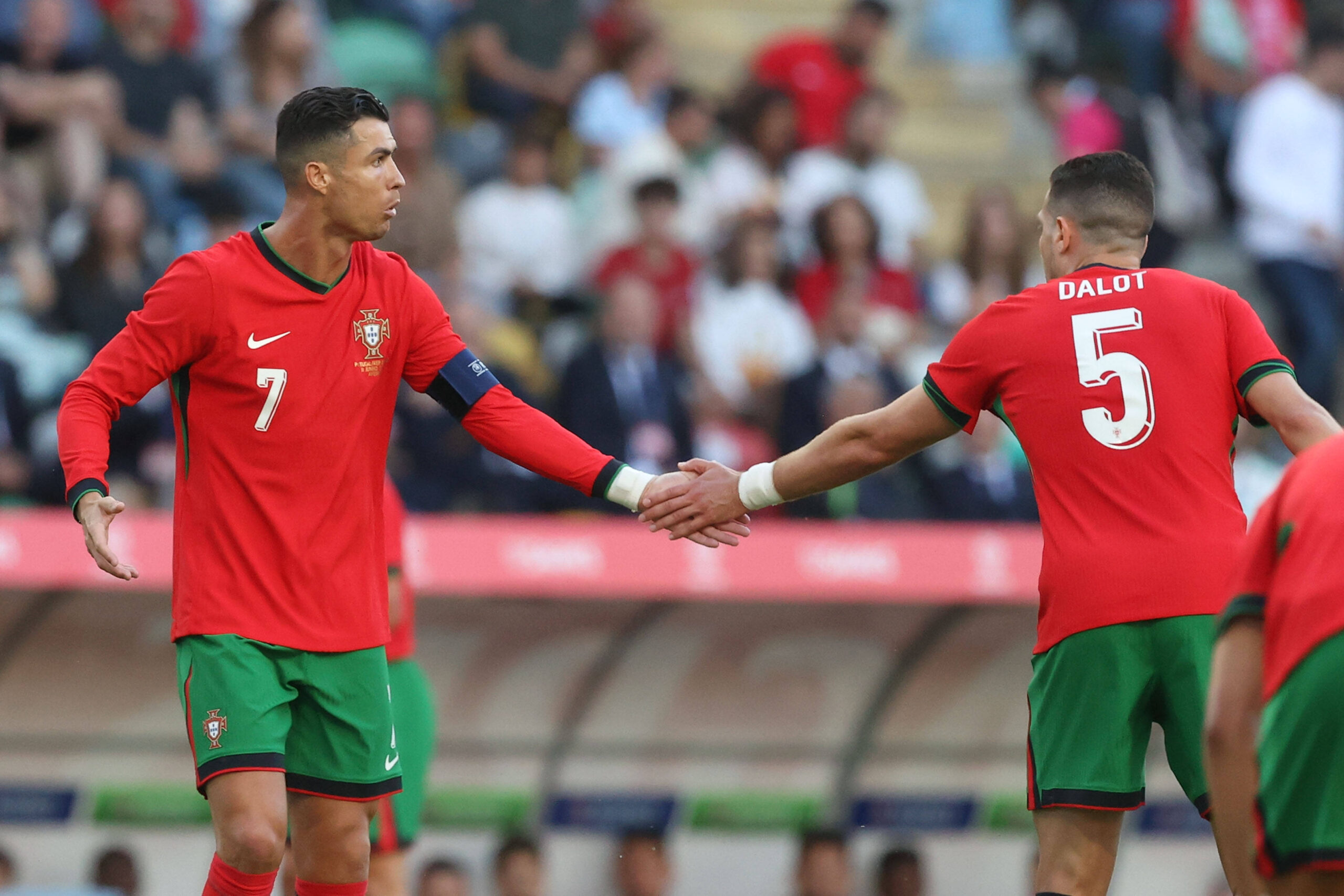 Cristiano Ronaldo and Diogo Dalot during a friendly match against Ireland.
