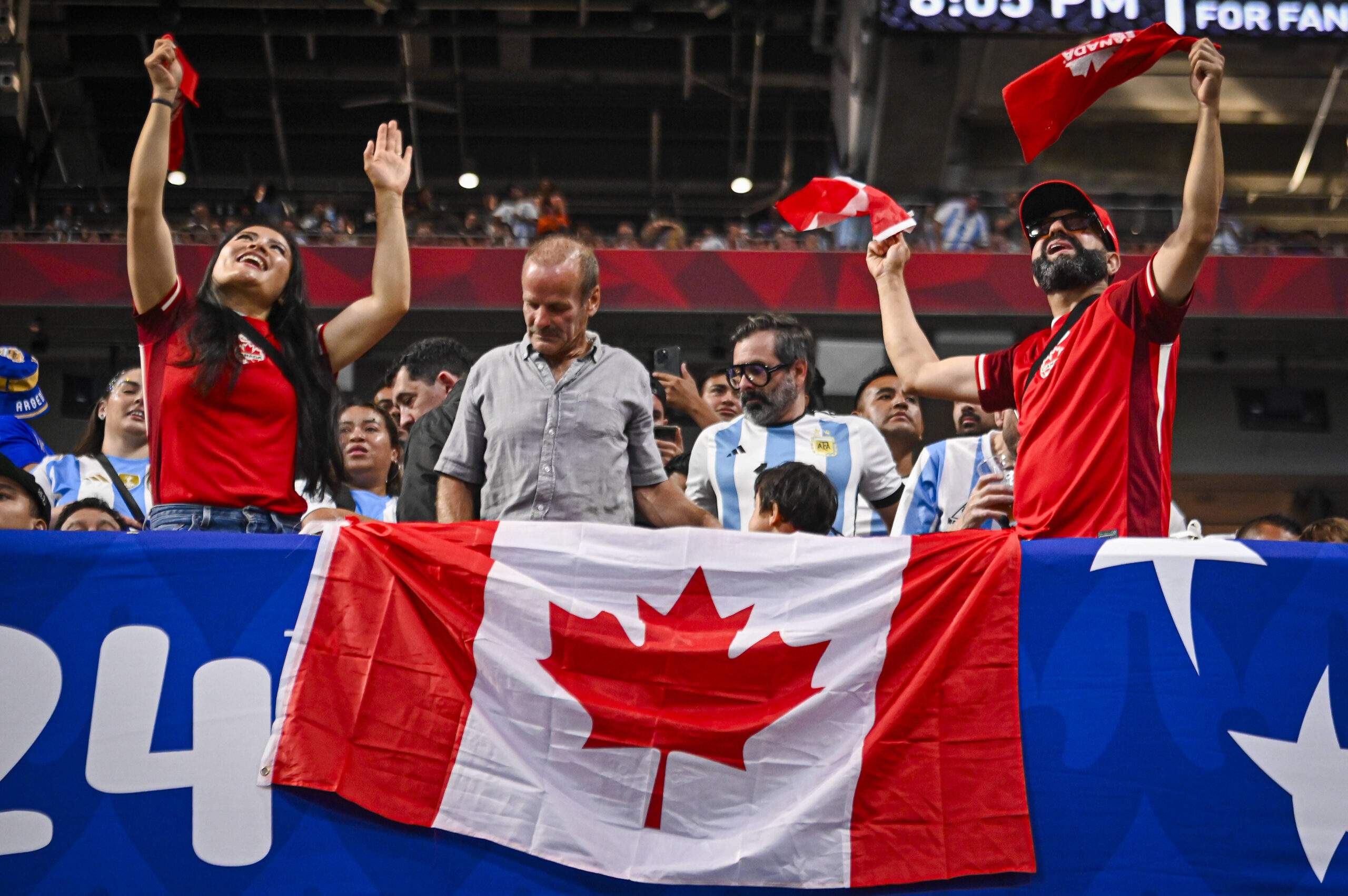 Canadian football fans with a flag during the Copa America clash with Argentina