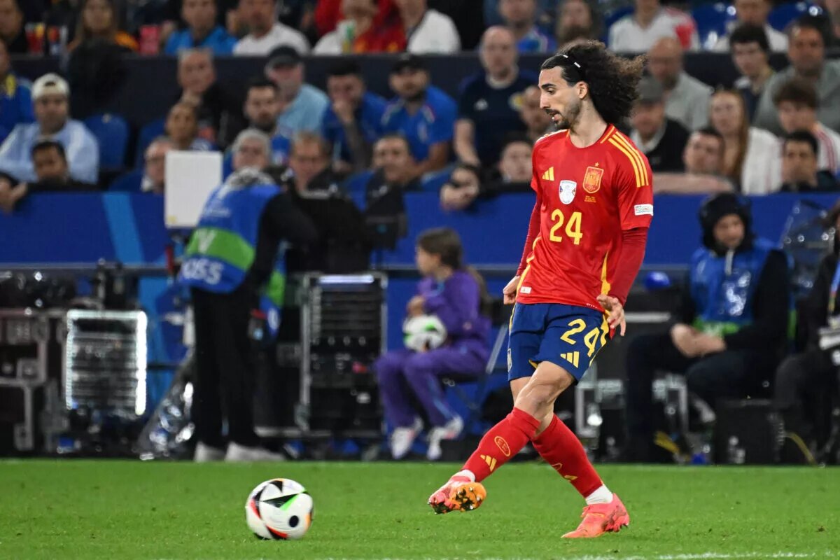 Marc Cucurella passing the ball for Spain during Euro 2024