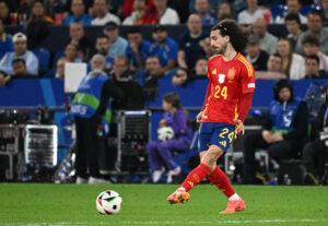 Marc Cucurella passing the ball for Spain during Euro 2024