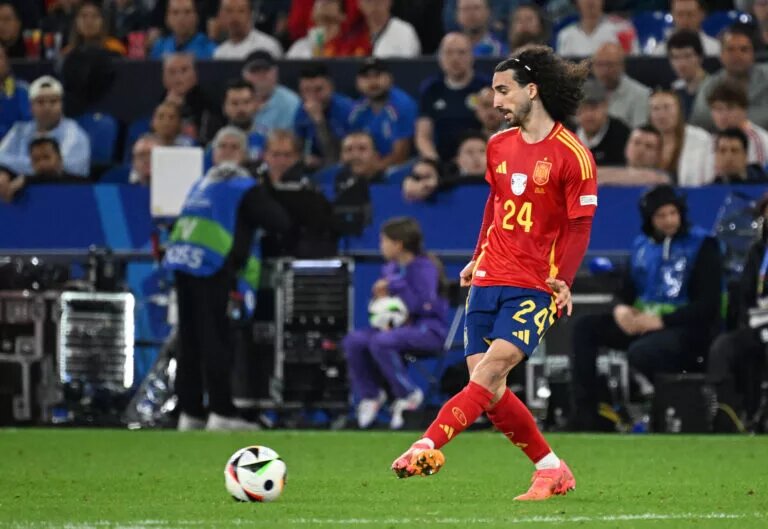 Marc Cucurella passing the ball for Spain during Euro 2024