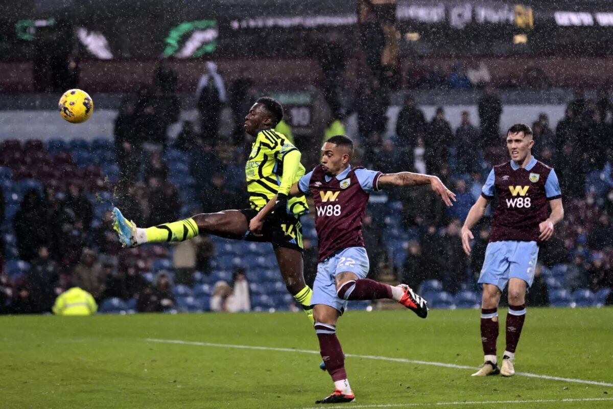 Eddie Nketiah challenges for the ball against Burnley's Vitinho