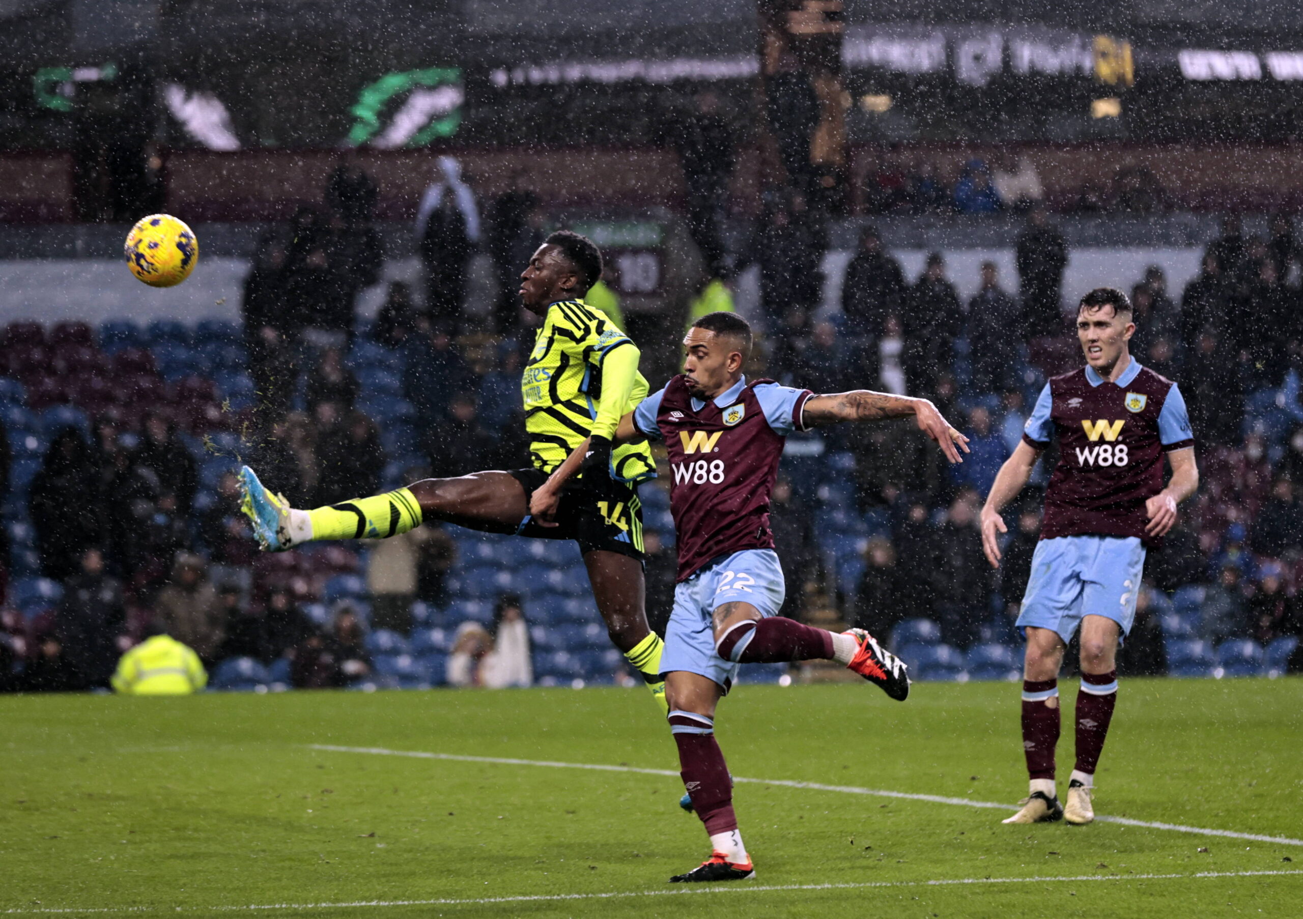 Eddie Nketiah challenges for the ball against Burnley's Vitinho