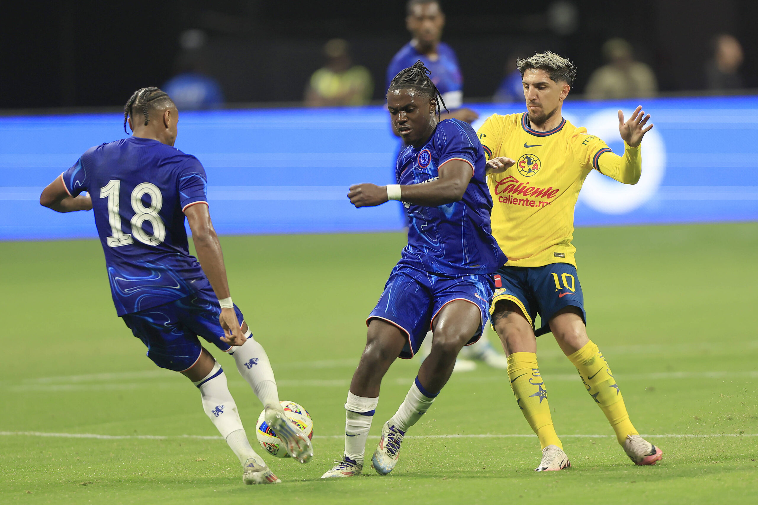 Romeo Lavia and Christopher Nkunku in action against Club America