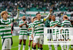 Celtic Players celebrate goal against Rangers