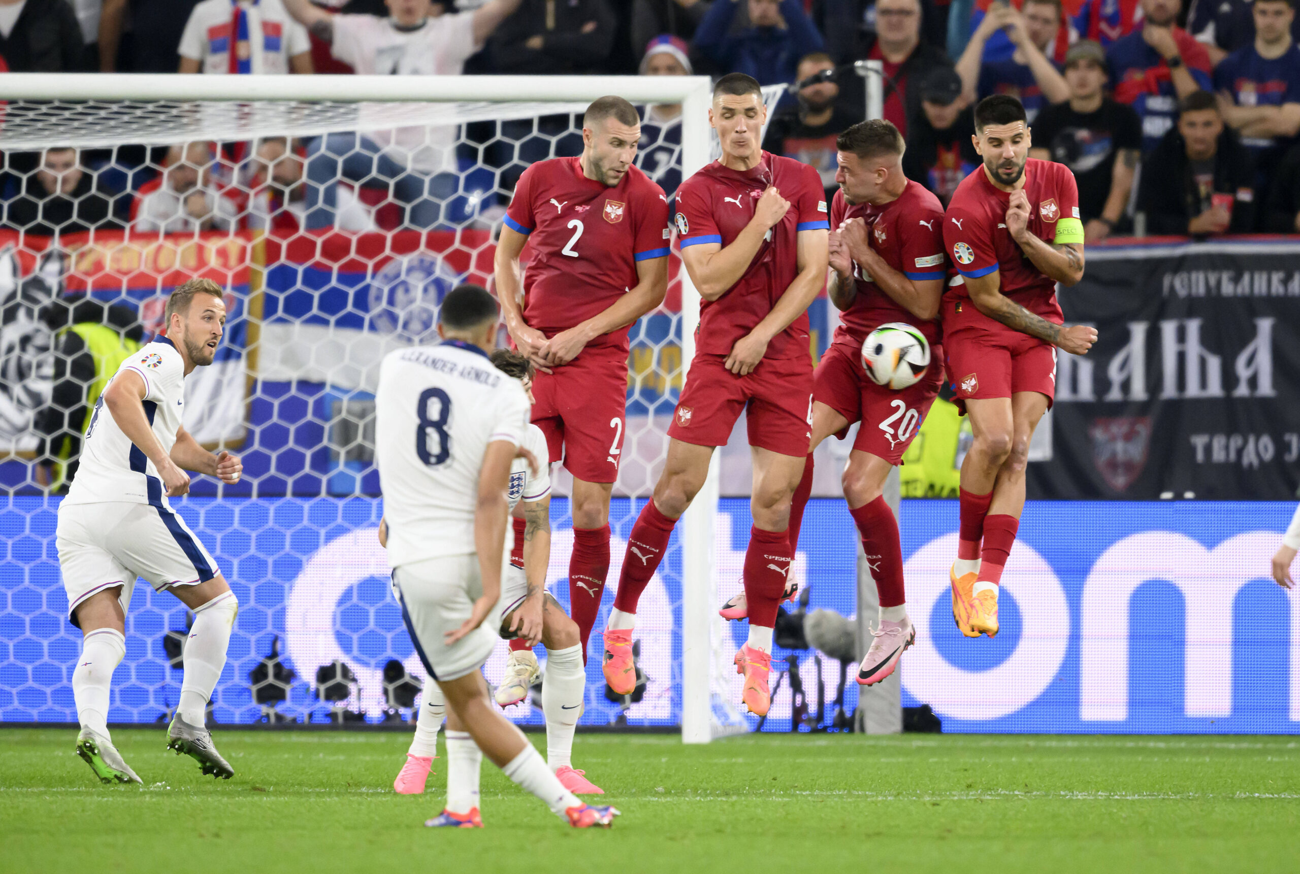 Trent Alexander-Arnold fires a free kick towards goal