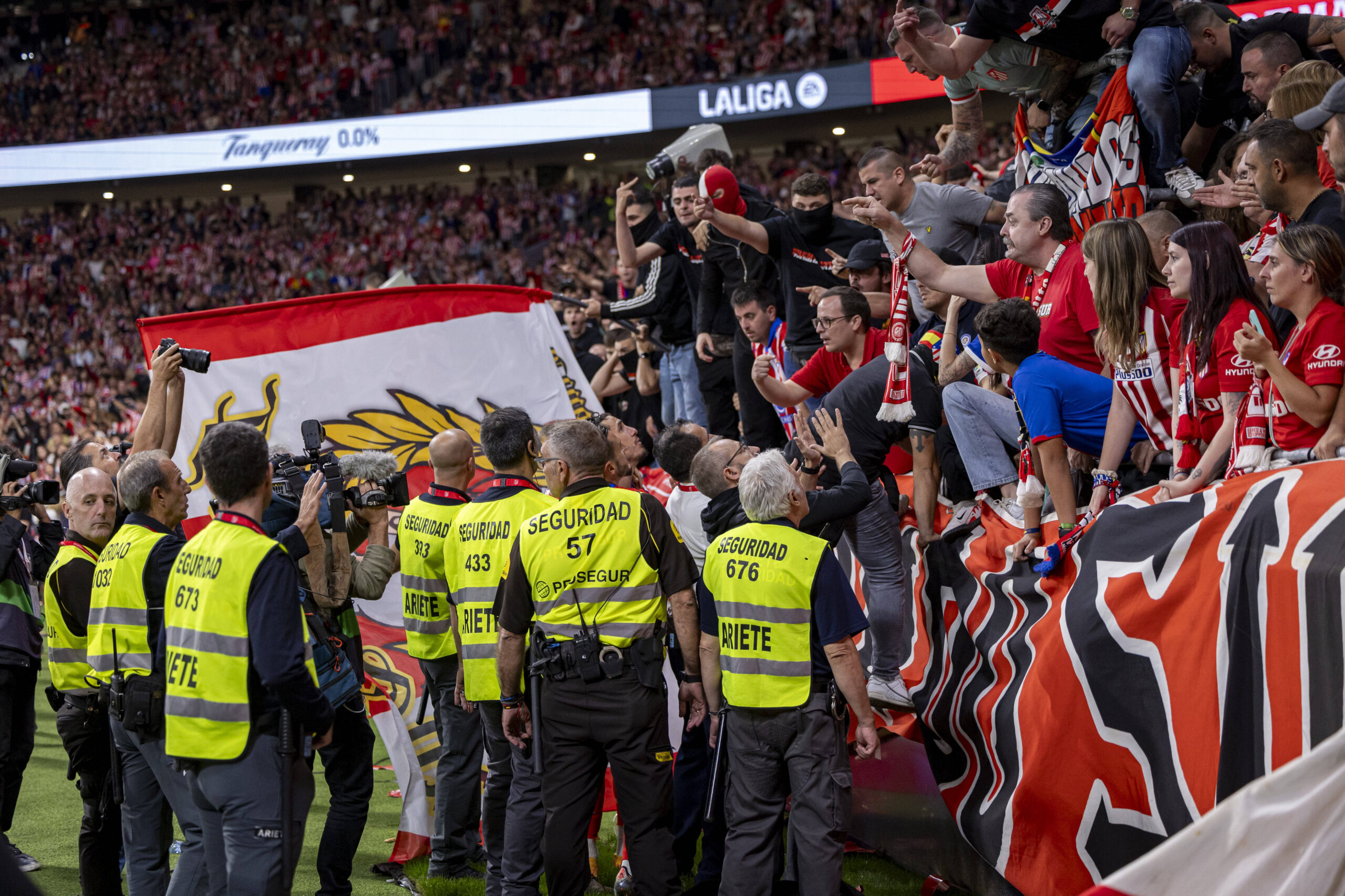 Atletico Madrid fans confront security