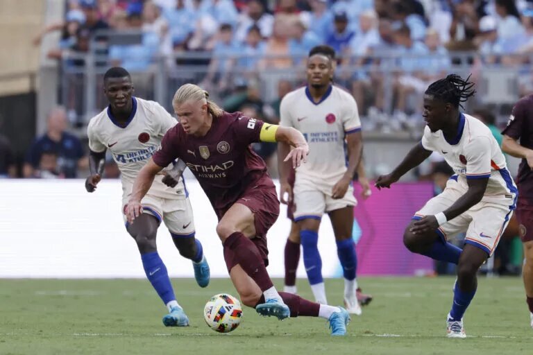 Romeo Lavia and Moises Caicedo close down Erling Haaland during pre-season friendly