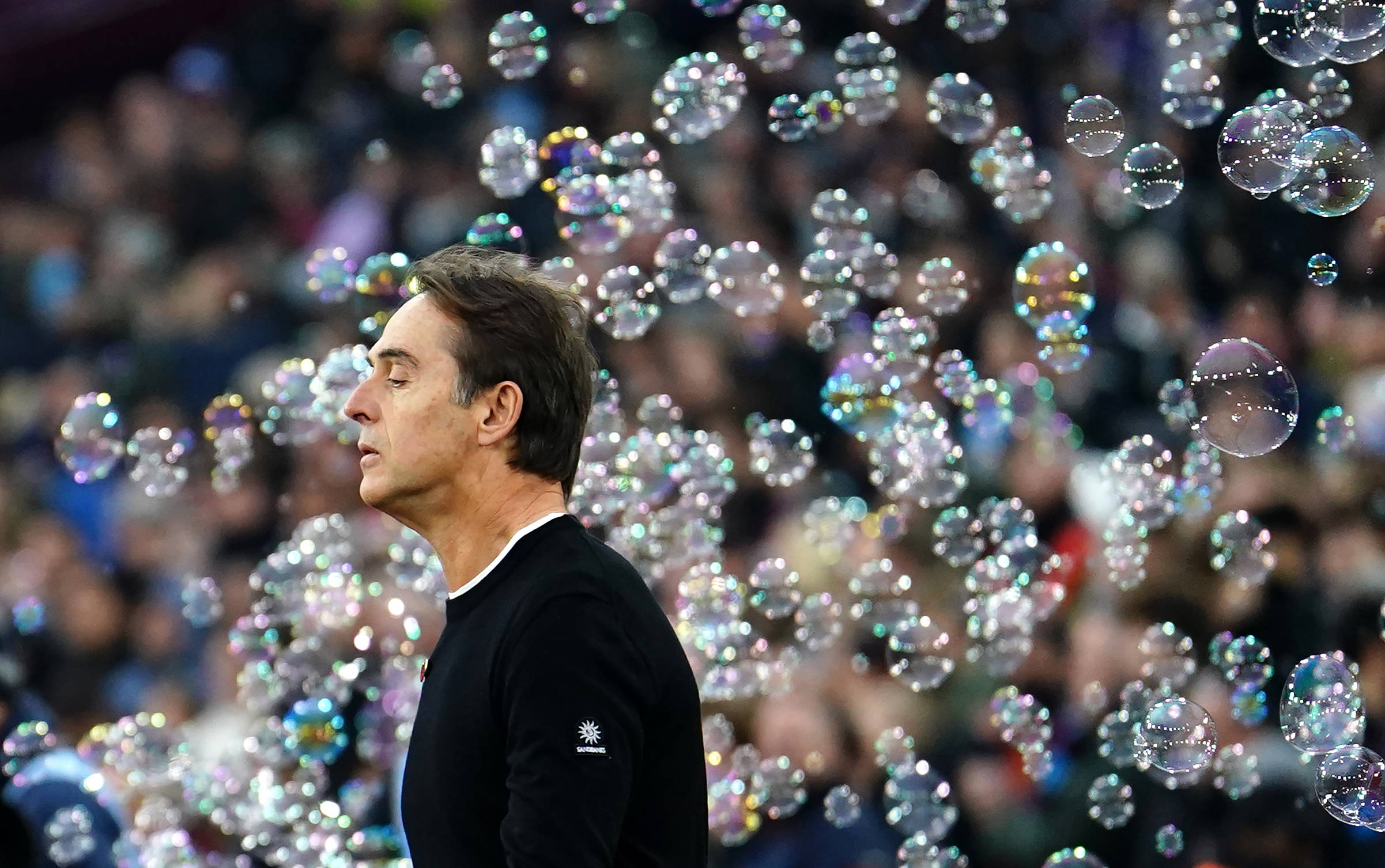 Julen Lopetegui surrounded by bubbles at home game